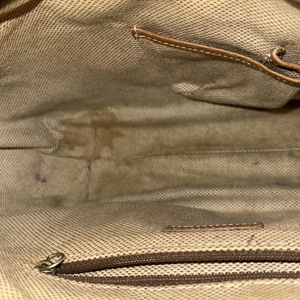 Dooney and Bourke classic monogram canvas and leather Tan color small hobo bag